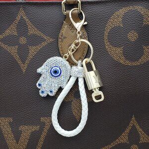 Authentic Louis Vuitton Lock & Key with unbranded Evil Eye Bagcharm